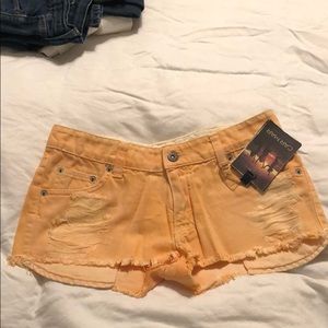 Orange carmar denim shorts